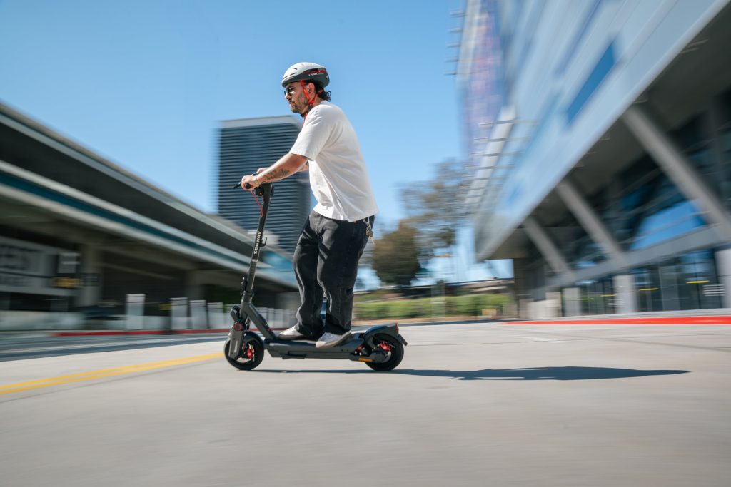 Rider on a Segway Ninebot MAX G3 electric scooter in the city