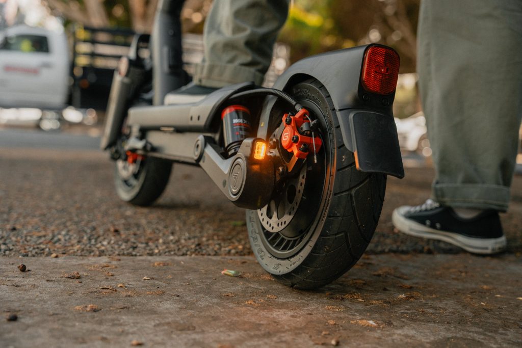 Rear turn signal lit on a Segway MAX G3 Plus electric scooter, next to the brake light