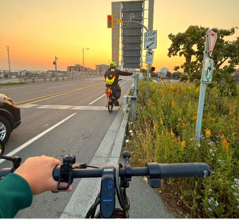 View from a Segway F2 Pro handlebar during a sunrise commute in Victoria, BC